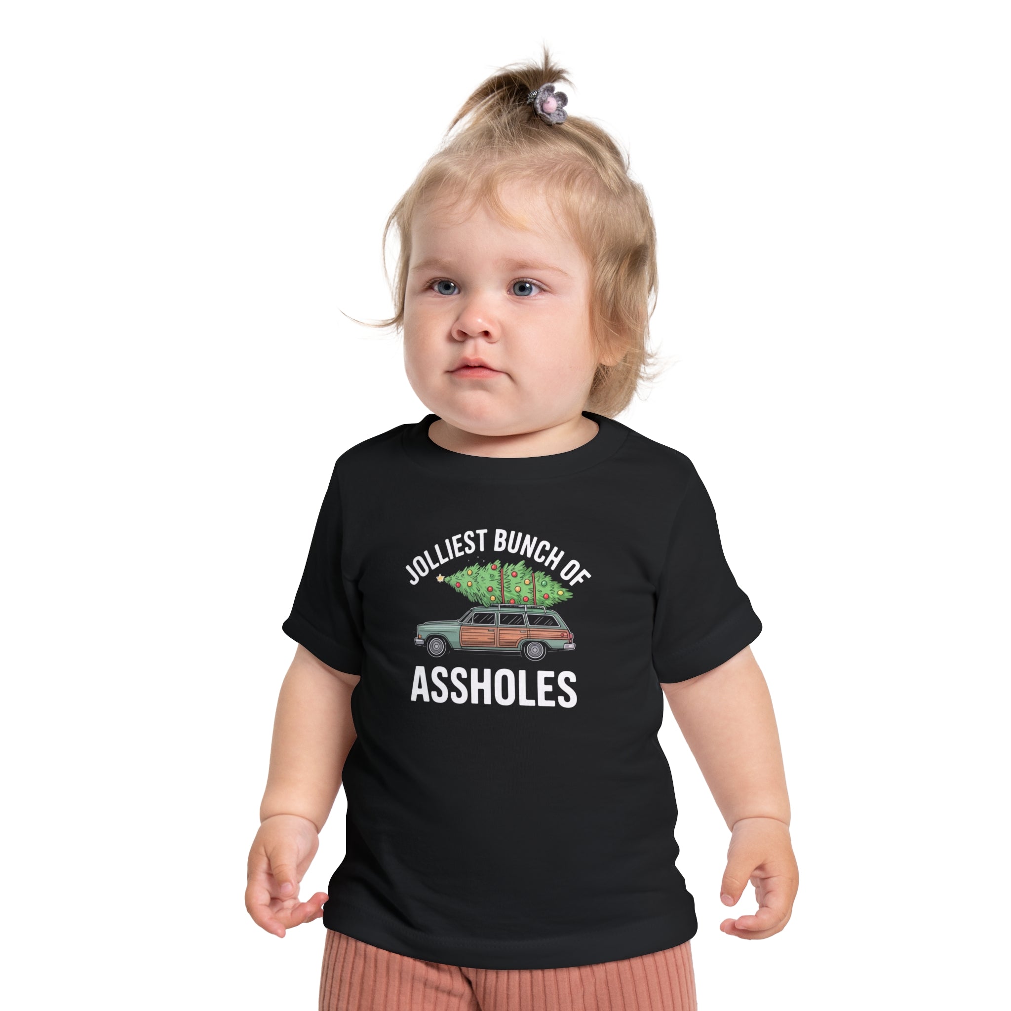 Child wearing a black t-shirt with graphic design and text